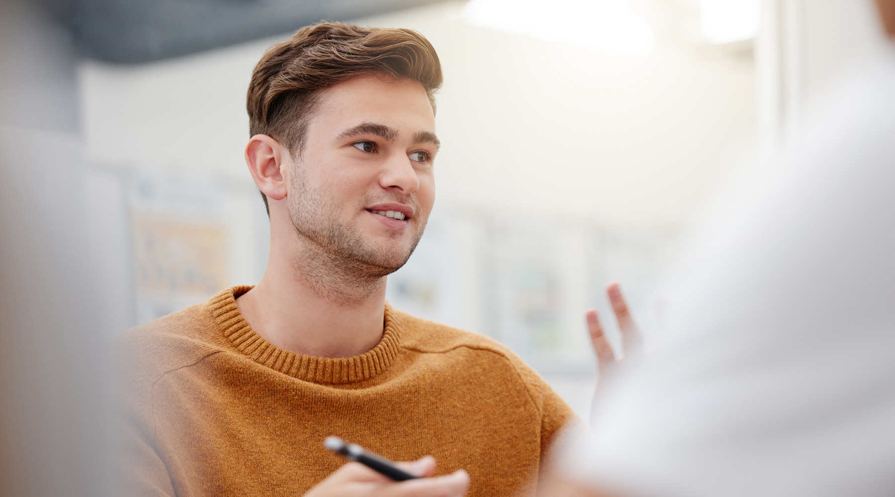Man discussing at metting about life science industry matters