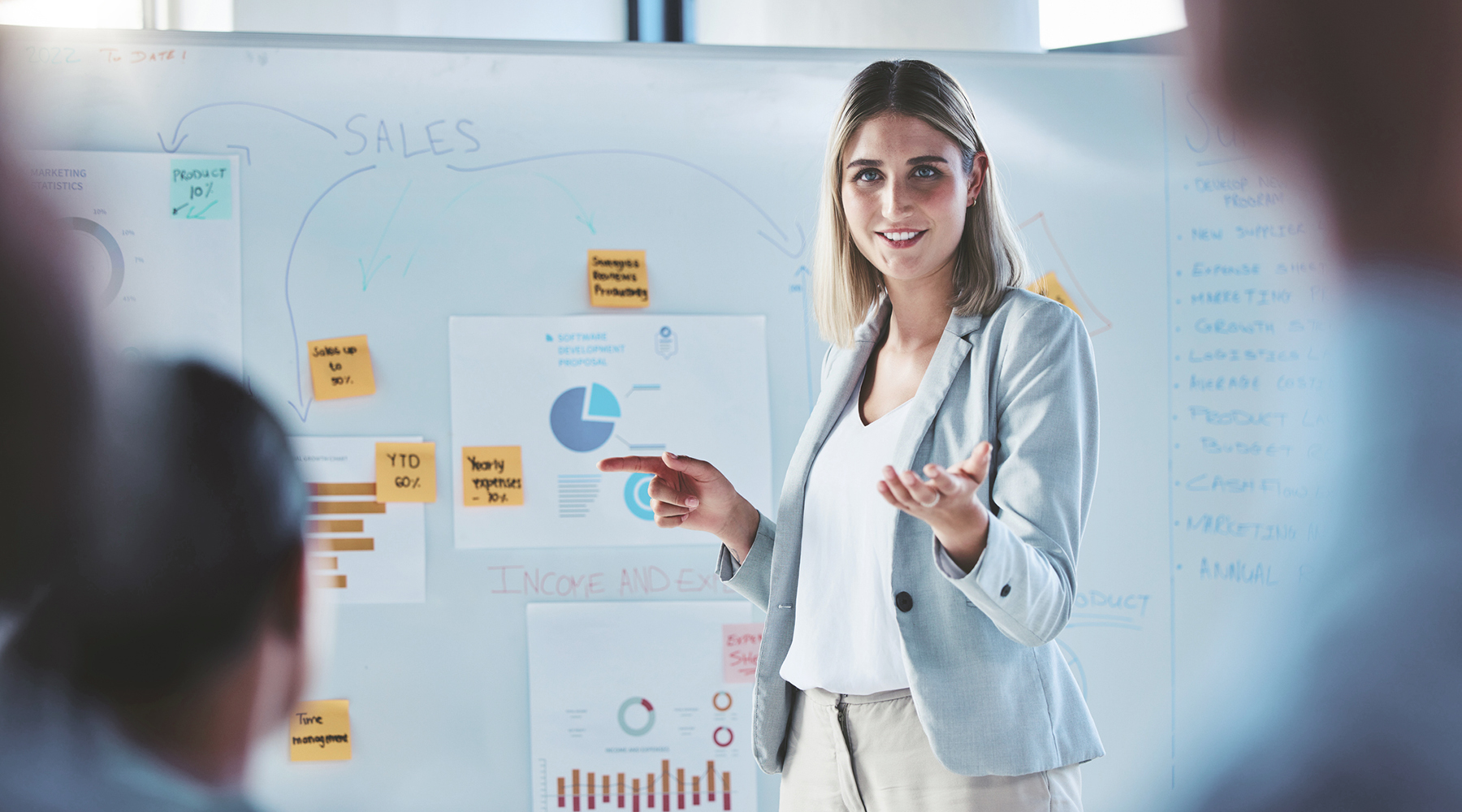 Woman presenting Real-World Evidence graphs